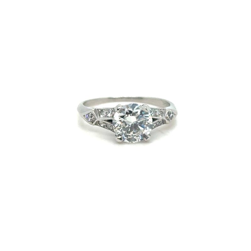 Platinum old European cut diamond Art Deco engagement ring, 1.25 ct G-H/VS1–VS2 center stone, geometric stepped shoulders with single-cut diamond accents, plain polished tapered shank, size 5