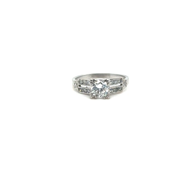Platinum round brilliant diamond engagement ring, 0.56 ct center stone, 0.75 CTW G-H color SI1–SI2 clarity, Mid Century, circa 1950s