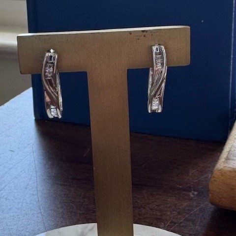 14K white gold baguette diamond twisted ribbon channel-set hoop earrings, I-J color I1 clarity, hinged snap-back closure, contemporary