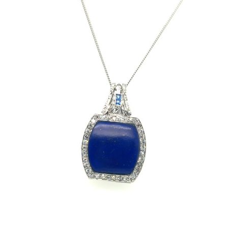 Platinum lapis lazuli and single-cut diamond Art Deco watch face case pendant, 7.24 ct lapis lazuli, 0.48 CTW diamond accents