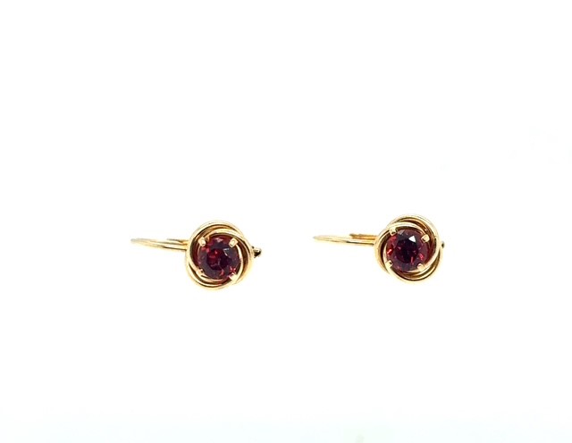 14K yellow gold Mozambique garnet love knot drop earrings, 0.85 CTW round-cut garnets, four-prong center setting, polished love knot surround, French wire backs, 1.4 grams, circa 1980s