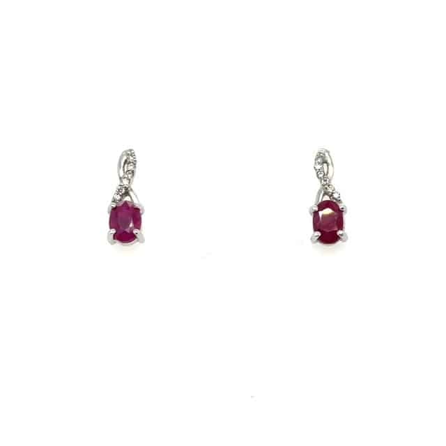 14K white gold oval ruby and round brilliant diamond drop earrings, 1.05 CTW ruby, 0.06 CTW G-H/VS–SI diamond accents, twisted ribbon post, four-prong ruby head, post backs, contemporary