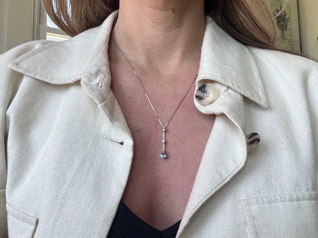 14K white gold aquamarine and diamond pendant, 0.64 ct aquamarine, 0.11 CTW diamond accents, chain not included