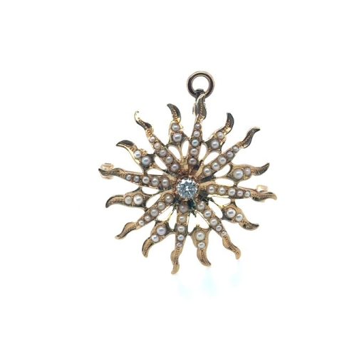 14K yellow gold Victorian diamond and seed pearl wavy sunburst brooch/pendant, 0.20 ct G-H/SI star-set diamond center, graduating seed pearl rays, open-work construction, loop bail and pin back, 1¼" diameter, 5.2 grams