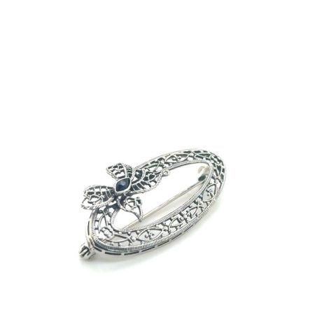 10K white gold synthetic blue sapphire Art Deco oval filigree brooch, marquise-cut sapphire center, open-work foliate motif, milgrain detailing, pin back with safety catch