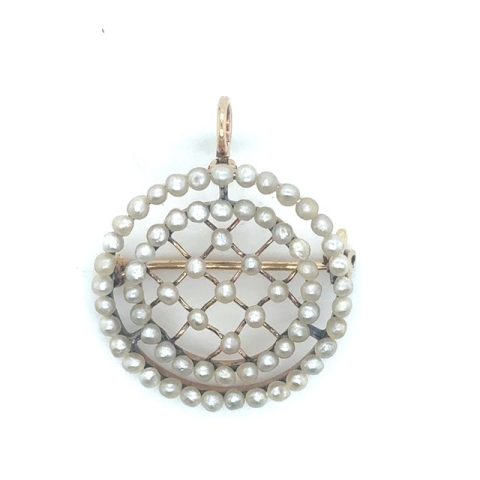 14K yellow gold Edwardian seed pearl circle brooch/pendant, 66 seed pearls in three-tier arrangement — 9-pearl diamond grid center, 24-pearl inner circle, 33-pearl outer circle, open-work gold frame, loop bail and pin back, 1" x ⅞", 3.1 grams Product Categories: Pins and Brooches