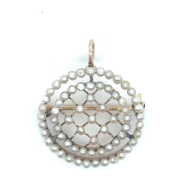 14K yellow gold Edwardian seed pearl circle brooch/pendant, 66 seed pearls in three-tier arrangement — 9-pearl diamond grid center, 24-pearl inner circle, 33-pearl outer circle, open-work gold frame, loop bail and pin back, 1" x ⅞", 3.1 grams Product Categories: Pins and Brooches