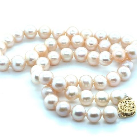 Yellow gold-filled cultured freshwater pearl strand necklace, 54 peachy-pink pearls graduating 7.5–8.5mm, hand-knotted silk cord, filigree ball clasp, 18" length
