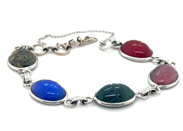 Sterling silver Egyptian Revival scarab bracelet with five carved multi-color cabochons in oval bezels, 7 inches