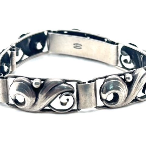 Sterling silver scroll and leaf link bracelet signed John Lauritzen, 7.5 inches