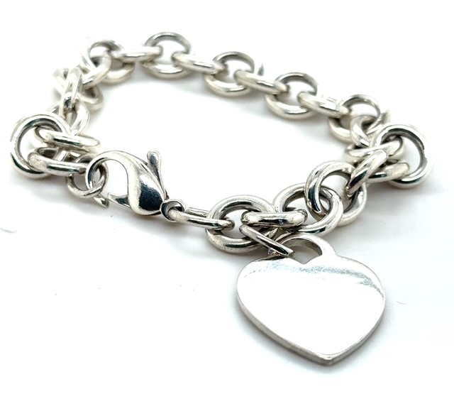 Sterling silver heart tag charm bracelet signed Tiffany & Co., 7.5 inches