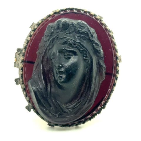 Base metal French jet mourning brooch with carved classical goddess figure, Victorian