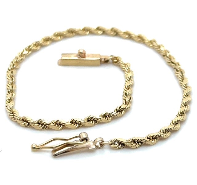 14K yellow gold rope chain bracelet, 2.5mm wide, 7.25" length, diamond-cut twist finish, barrel clasp with safety tab, 4.2 grams