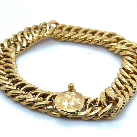 18K yellow gold double curb link bracelet, diamond-cut textured interlocking double curb links, box clasp with safety button, 7.5" length, 40.4 grams, circa 2000s