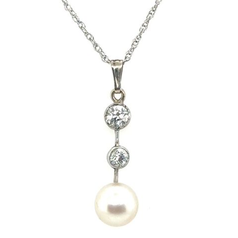 Platinum and 18K yellow gold old European cut diamond and cultured pearl vertical drop pendant, approx. 0.55 CTW G-H-I/VVS graduated OEC diamond bezels, 7.7mm cultured pearl drop, two-metal construction, Art Deco, chain not included