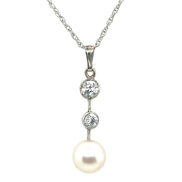 Platinum and 18K yellow gold old European cut diamond and cultured pearl vertical drop pendant, approx. 0.55 CTW G-H-I/VVS graduated OEC diamond bezels, 7.7mm cultured pearl drop, two-metal construction, Art Deco, chain not included
