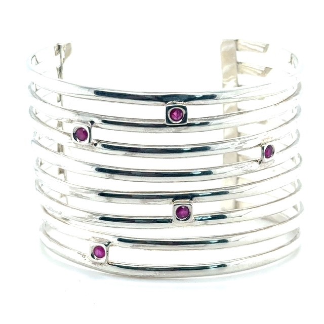 Sterling silver multi-row cuff bracelet with bezel-set round rubies, signed Elle