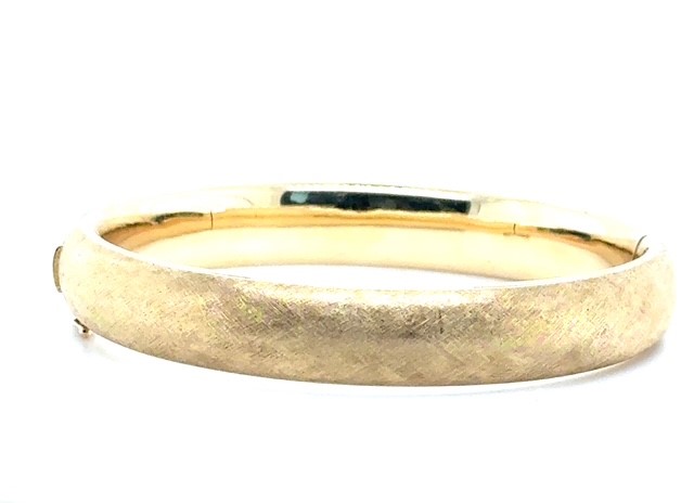 14K yellow gold satin finish hinged bangle bracelet, ⁷⁄₁₆" wide, box hinge with safety clasp, 24.3 grams, circa 1980s