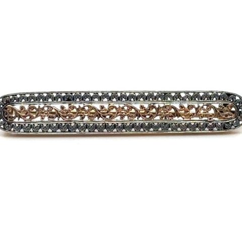 14K rose gold and sterling silver acanthus motif Victorian bar brooch, continuous rose gold scrollwork center, oxidized silver open-work filigree border, pin back with safety catch, approx. 2" x ⅝", 3.1 grams