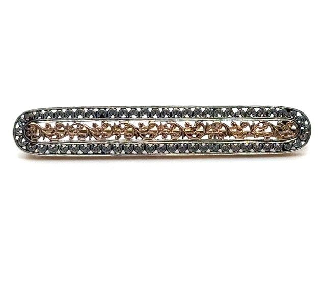 14K rose gold and sterling silver acanthus motif Victorian bar brooch, continuous rose gold scrollwork center, oxidized silver open-work filigree border, pin back with safety catch, approx. 2" x ⅝", 3.1 grams
