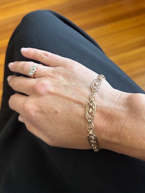 10K yellow gold Art Deco open-work link bracelet, seven rectangular heart and foliate scroll links alternating with six cushion flower links, fold-over clasp, 7.5" length, 8.5mm wide, 5.06 grams, sold as is Product Categories: Bracelets