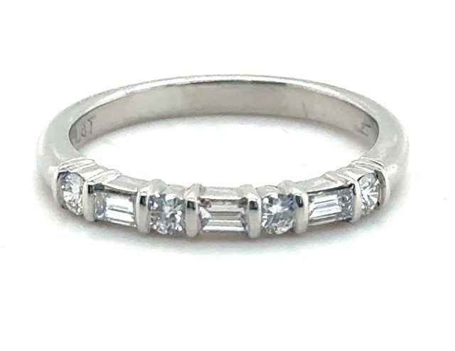 Platinum bar-set straight baguette and round diamond wedding band, 1950s