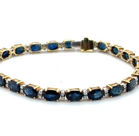 18K two-tone gold sapphire and diamond tennis bracelet, 16 CTW sapphires, 0.46 CTW diamonds