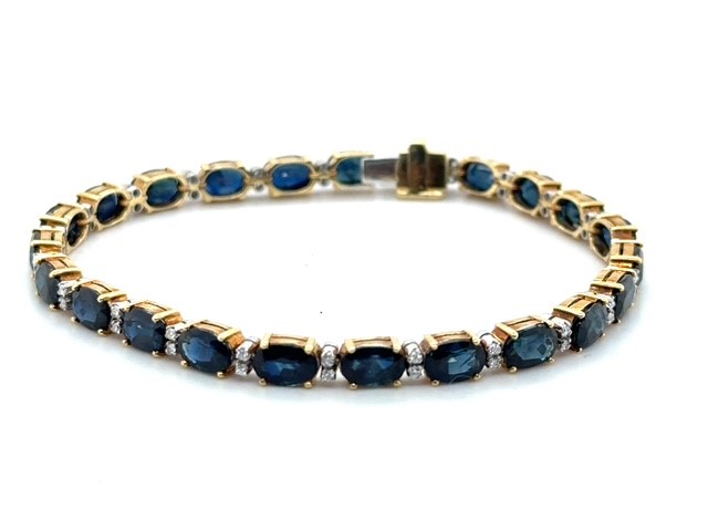 18K two-tone gold sapphire and diamond tennis bracelet, 16 CTW sapphires, 0.46 CTW diamonds