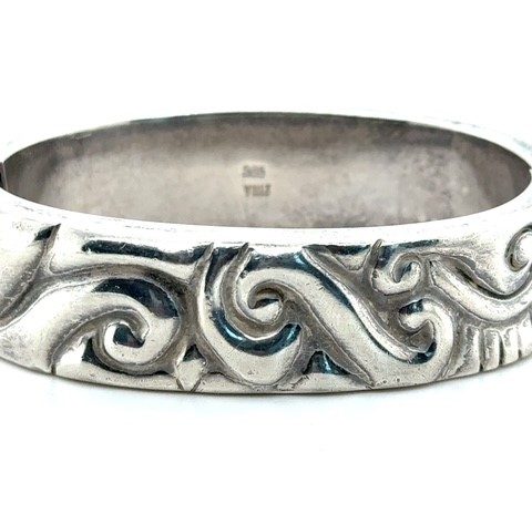 Sterling silver Zina hinged bangle bracelet with scroll repousse design, 1990s