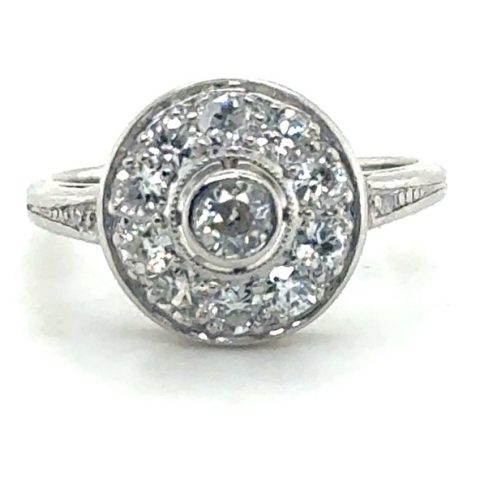 Platinum Art Deco old European cut diamond target ring with milgrain halo, circa 1920-1930