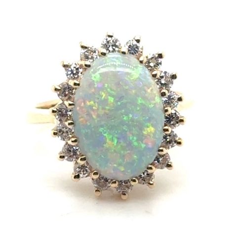 14K yellow gold Australian opal ring with round diamond halo