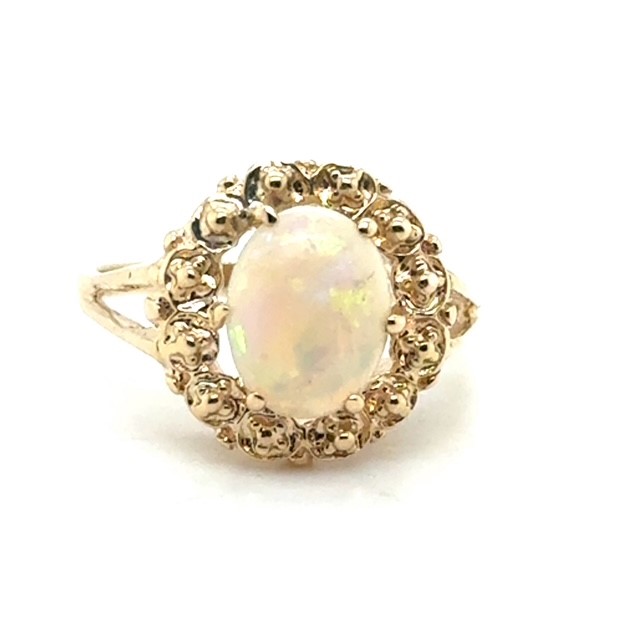 1970s 14K yellow gold oval cabochon opal ring with beaded halo and split shank